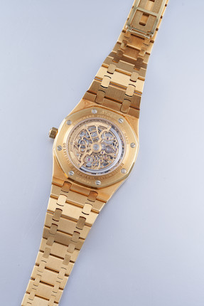 Bonhams : Omega Louis Brandt, A Fie Yellow Gold Perpetual Calendar Bracelet  Watch with Moon Phase, circa 1990