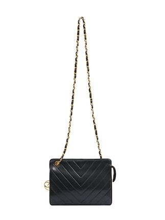 Bonhams : CHANEL BLACK CHEVRON QUILTED LAMBSKIN SHOULDER BAG WITH CC GOLD  TONE HARDWARE (includes serial sticker, authenticity card and original dust  bag)