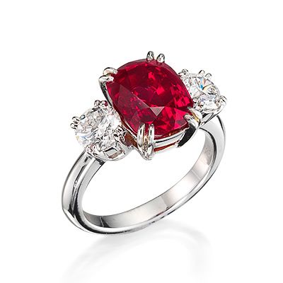 An important ruby and diamond three-stone ring