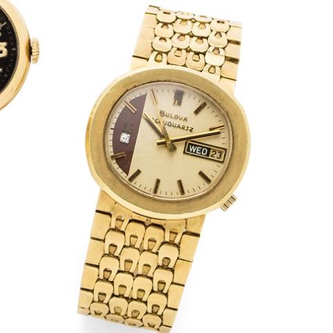 Bonhams : Bulova. An 18K gold quartz calendar bracelet watch Accuquartz ...