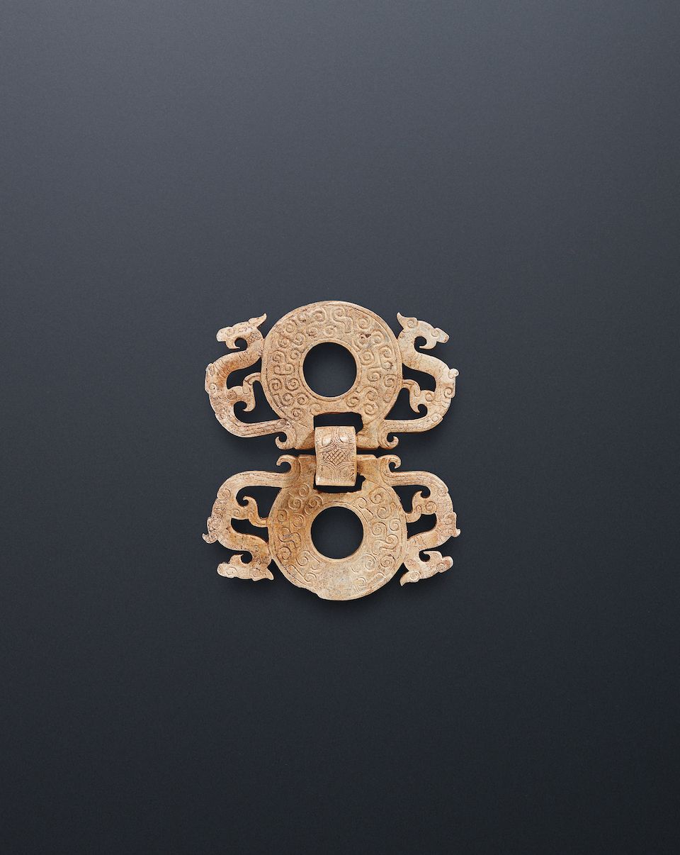 A very rare jade conjoined double bi-disc Warring States Period
