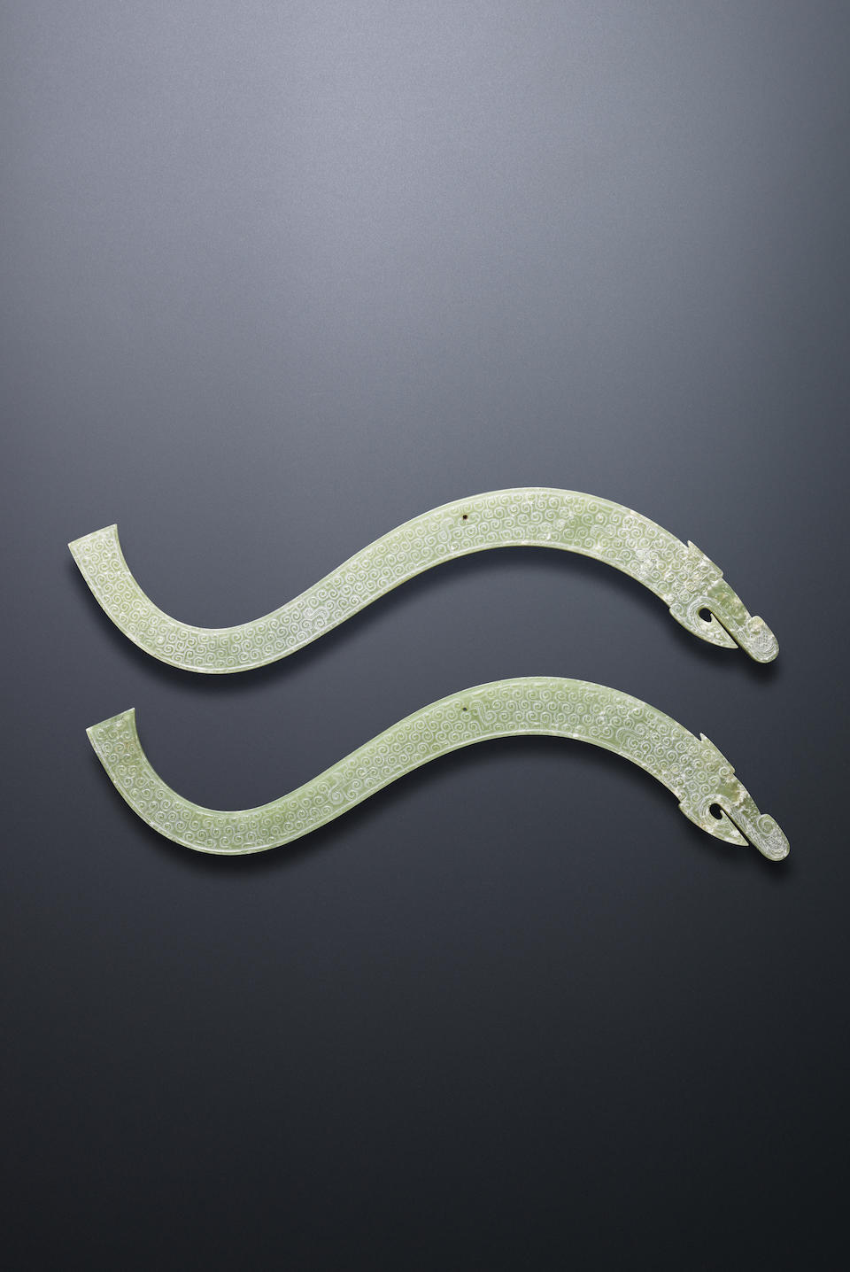 A pair of large pale green jade dragon plaques Warring States Period/Han Dynasty (2)