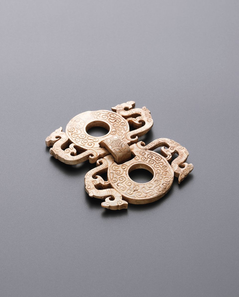 A very rare jade conjoined double bi-disc Warring States Period