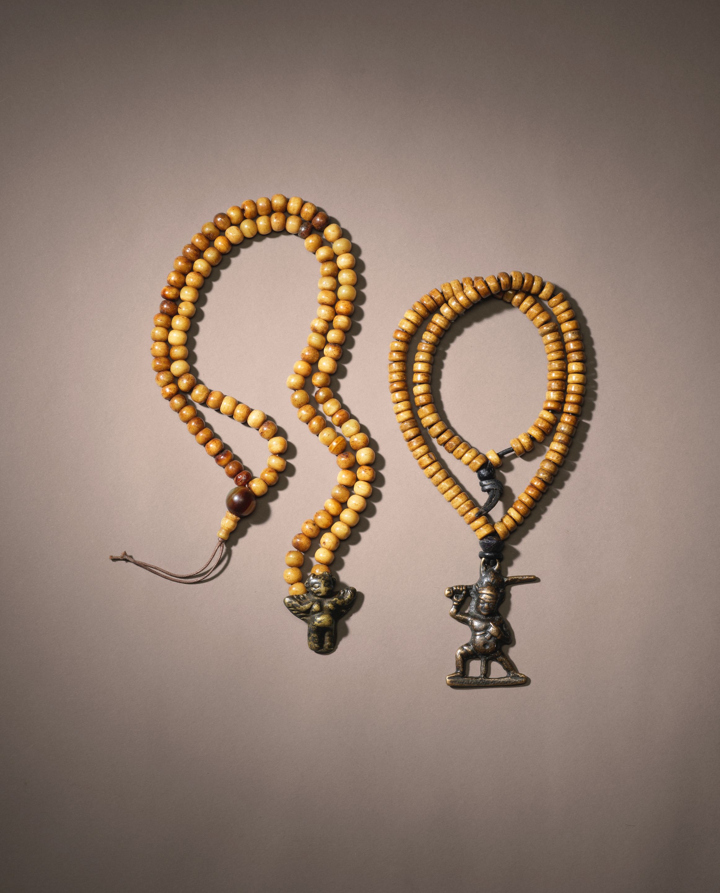 TWO BONE MALAS WITH THOGCHAK
