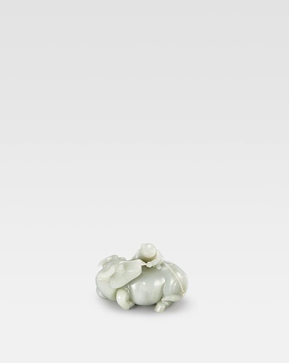 Bonhams A superbly carved pale green jade 'waterbuffalo and boy