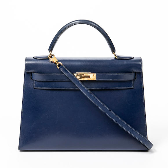 Bonhams : HERMÈS BLEU ELECTRIC SWIFT SELLIER KELLY POCHETTE WITH