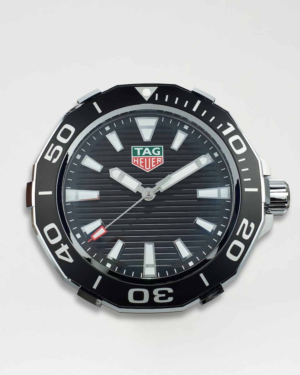 Bonhams Tag Heuer. A Wall Clock