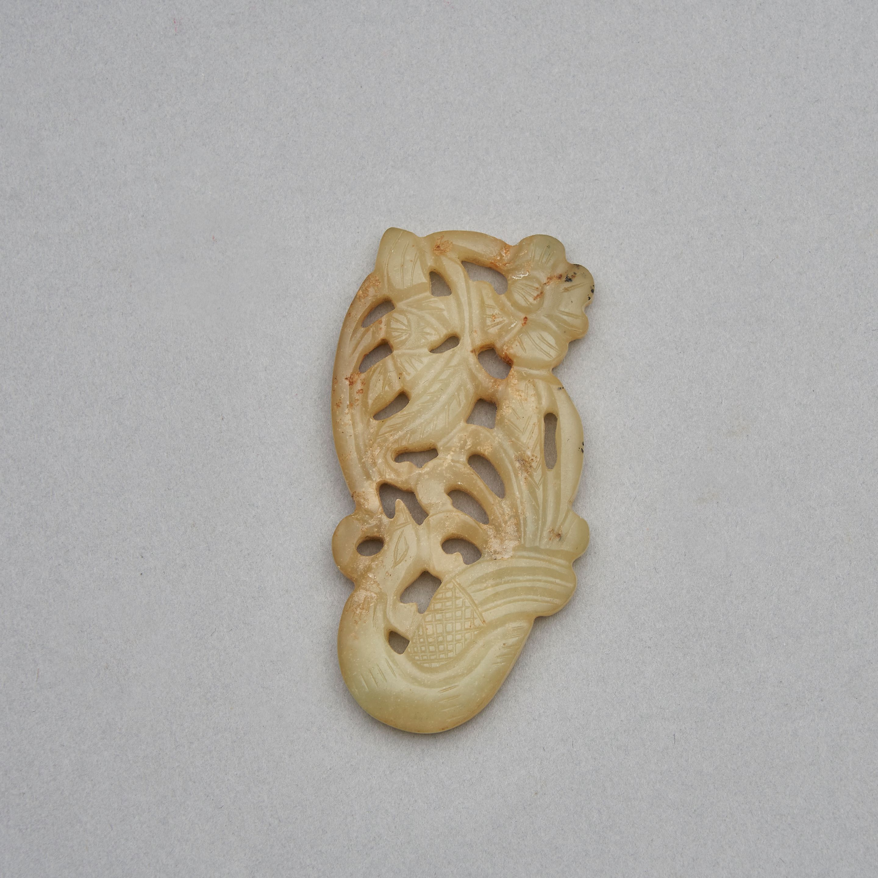 A celadon jade plaque