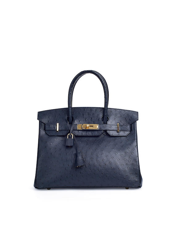 A DEEP BLUE OSTRICH LEATHER BIRKIN 25 WITH GOLD HARDWARE