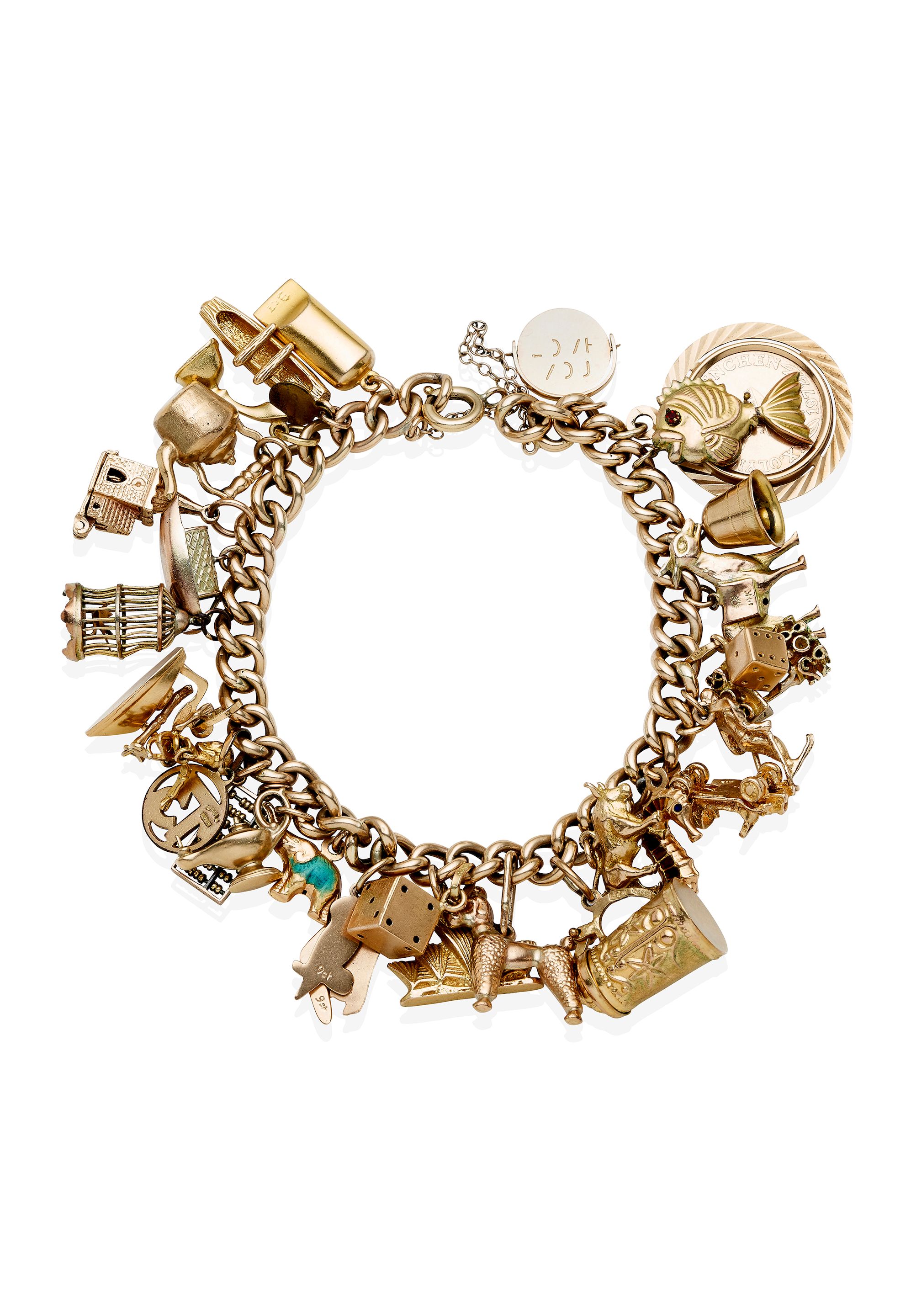 Bonhams A GOLD CHARM BRACELET