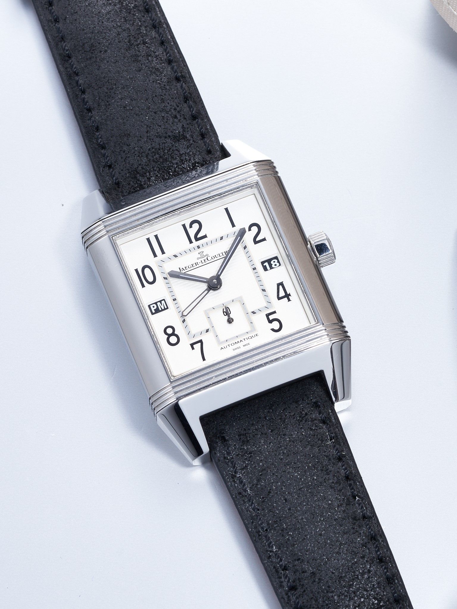 Bonhams JAEGER-LECOULTRE REVERSO SQUADRA HOMETIME,