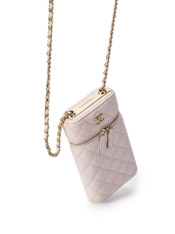 CHANEL LIGHT PINK LAMBSKIN PHONE BAG VANITY CASE WITH GOLD TONED CHAIN  (includes serial sticker, authenticity card, original dust bag and box) -  Bonhams