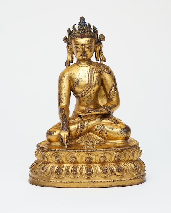 Bonhams : A gilt copper alloy figure of crowned Buddha Tibet, 15th century