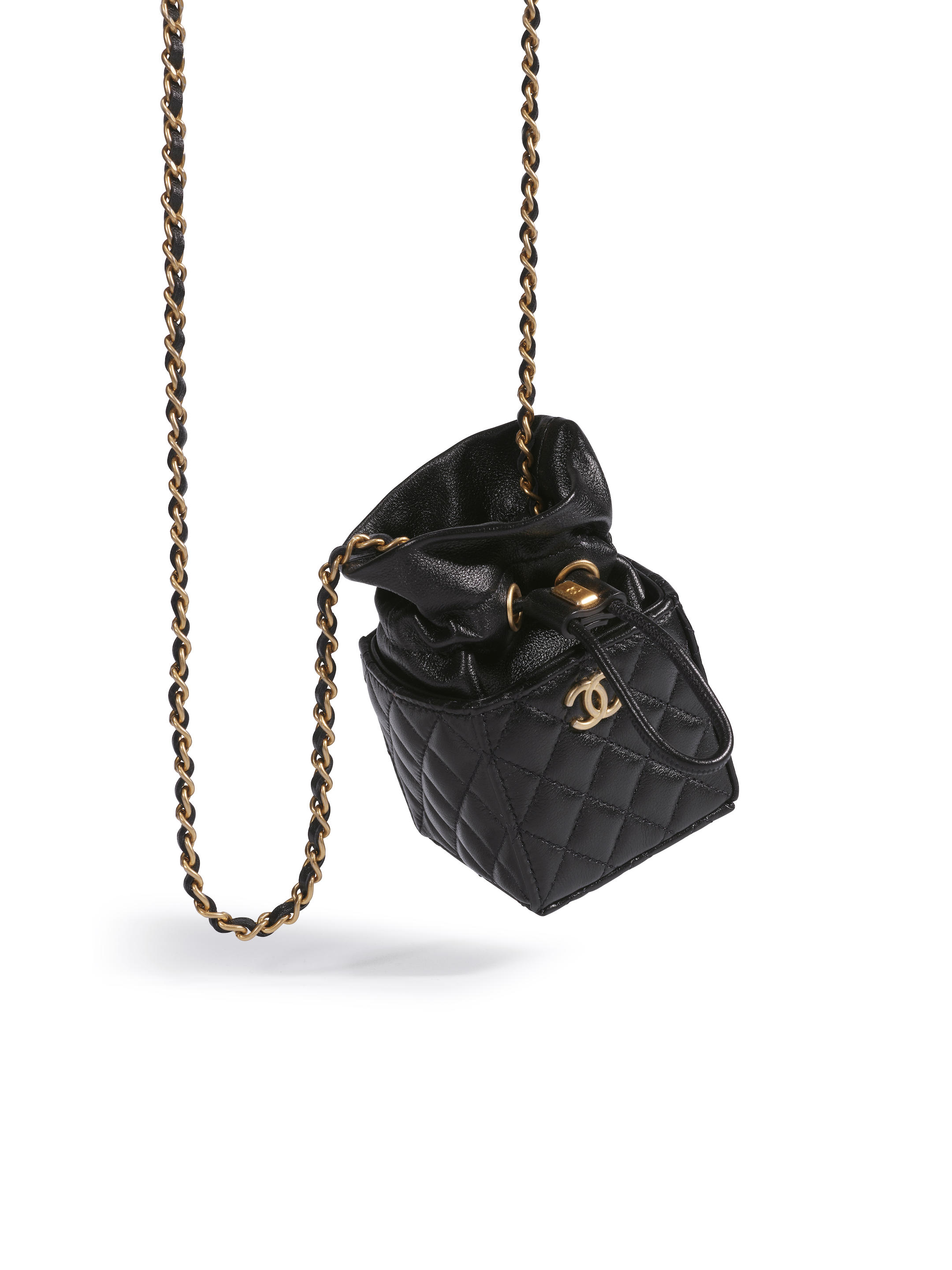 Bonhams : CHANEL BLACK LAMBSKIN LIPSTICK CASE WITH GOLD TONED CHAIN  (Includes authenticity card and original dust bag)