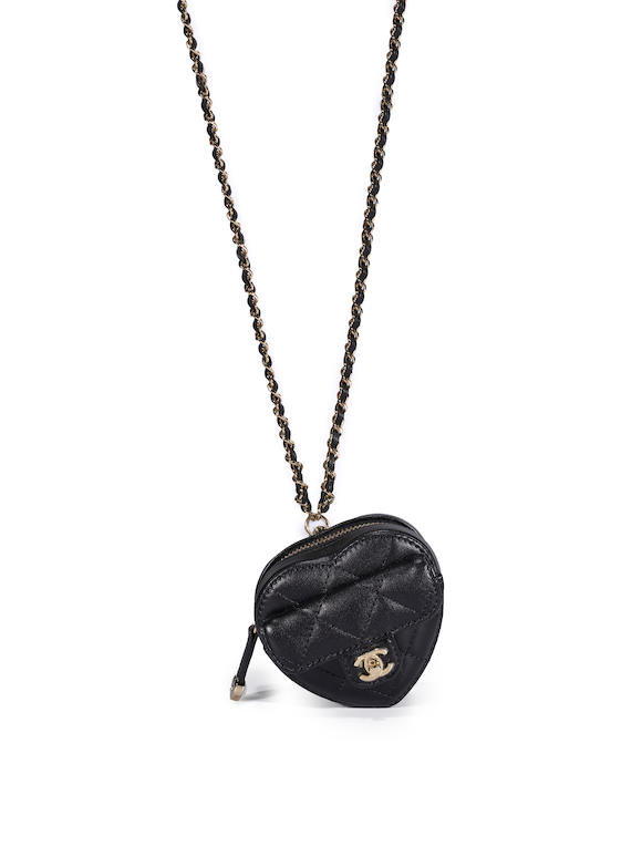 Bonhams : CHANEL BLACK LAMBSKIN LIPSTICK CASE WITH GOLD TONED CHAIN  (Includes authenticity card and original dust bag)