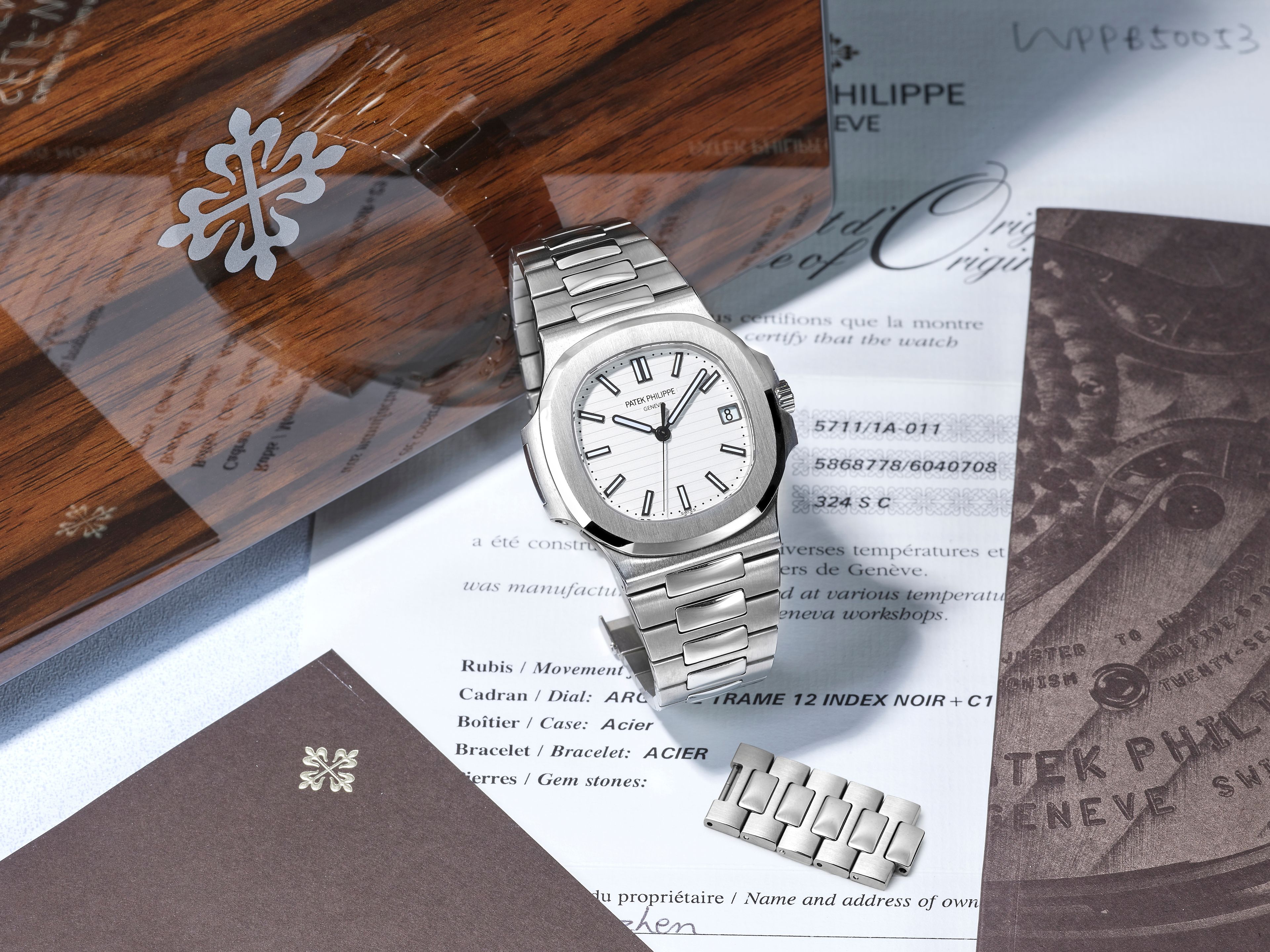 Bonhams PATEK PHILIPPE NAUTILUS, A STAINLESS