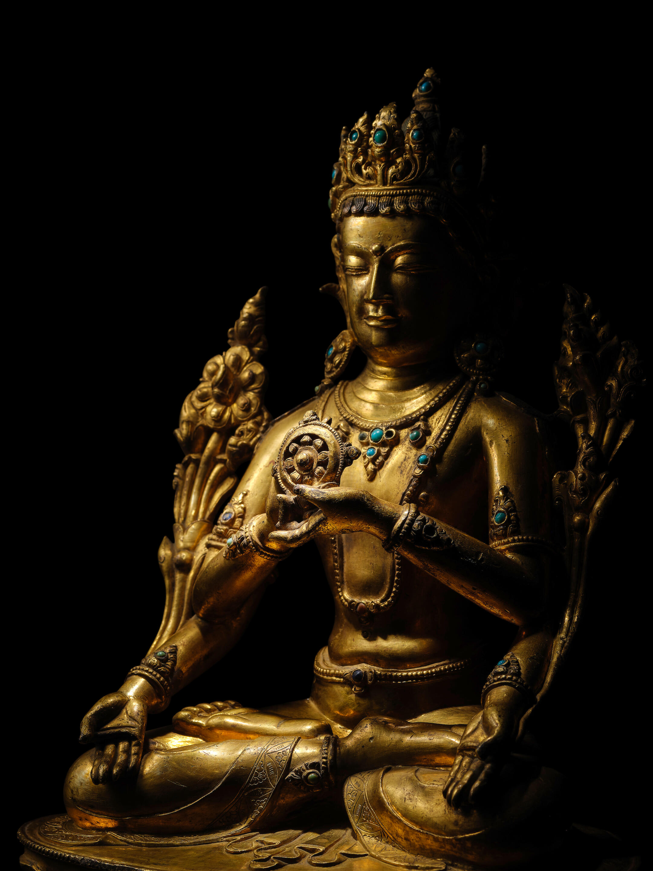 A GILT COPPER ALLOY FIGURE OF A BODHISATTVA