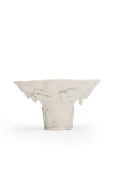 A DEHUA BLANC-DE-CHINE 'DRAGON' LIBATION CUP Qing Dynasty, 17th/18th century