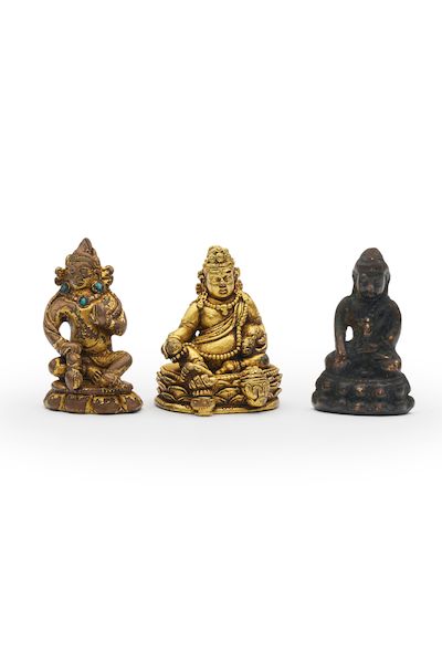 THREE COPPER ALLOY FIGURES OF YELLOW AND BLACK JAMBHALA AND BHAISAJYAGURU 19th/20th century (3)