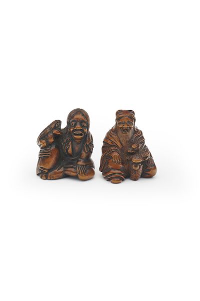 TWO BOXWOOD NETSUKE OF A MONK AND GAMA SENNIN 19th century (2)