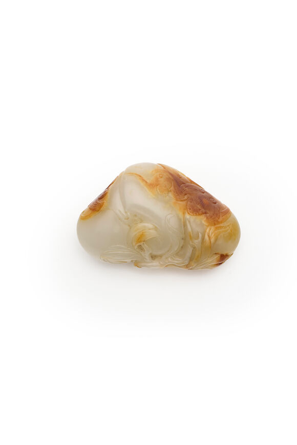 Bonhams : A PALE CELADON 'PEACH AND BAT' PEBBLE 19th century