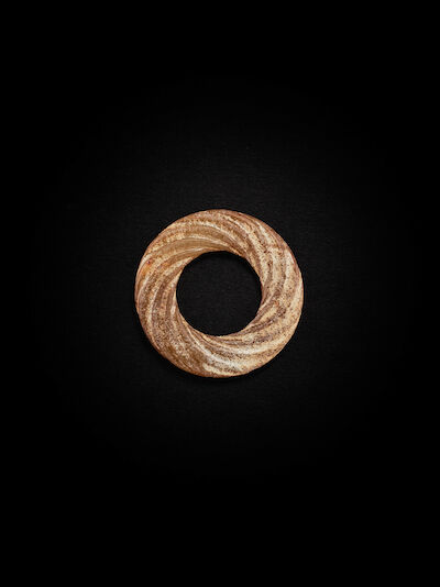 A SMALL JADE 'ROPE-TWIST' RING Warring States Period
