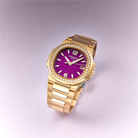 Bonhams : PATEK PHILIPPE | NAUTILUS, REF.7010/1R-013, A PINK GOLD AND DIAMOND-SET BRACELET WATCH WITH DATE, CIRCA 2024