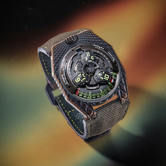 Bonhams : URWERK | REF.UR-100V T-REX, AN INNOVATIVE AND WELL-PRESERVED LIMITED EDITION BRONZED AND PVD TITANIUM SEMI-SKELETONISED WRISTWATCH WITH REVOLVING SATELLITE HOURS, DISTANCE TRAVELLED ON EARTH AND DISTANCE TRAVELLED BY EARTH INDICATION, CIRCA 2021