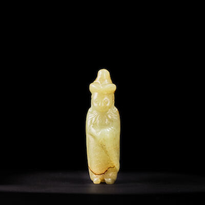 A YELLOW-JADE FIGURE OF A FOREIGNER Song Dynasty or later (2)