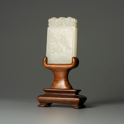 A GREENISH WHITE JADE 'PLUM BLOSSOM' PLAQUE 18th/19th century