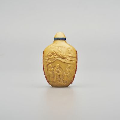A HORNBILL 'FIGURES' SNUFF BOTTLE Dated according to the inscription, 1852