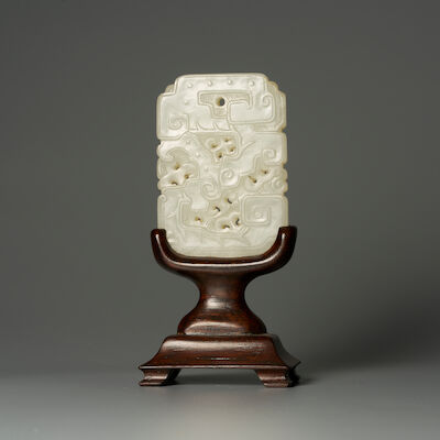 A RETICULATED GREENISH WHITE JADE 'DRAGON' PLAQUE 18th/19th century