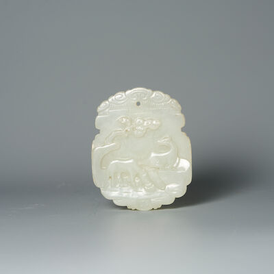 A WHITE JADE 'HORSES' PLAQUE 18th/19th century