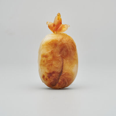 A WHITE AND RUSSET JADE 'MELON' SNUFF BOTTLE 19th century