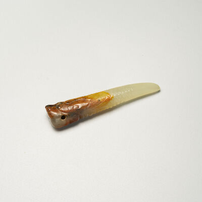A WHITE AND RUSSET JADE 'DRAGON' HAIR ORNAMENT, XI Ming Dynasty
