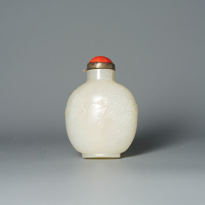 A WHITE JADE 'MAGPIE AND PLUM BLOSSOM' SNUFF BOTTLE 19th century