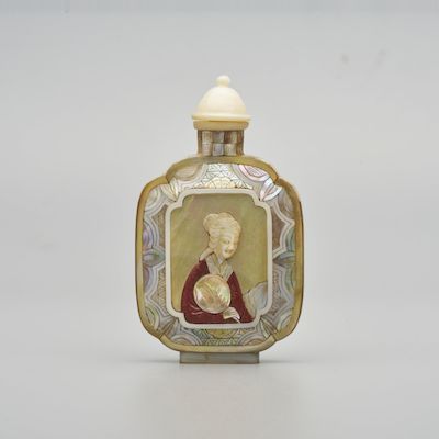 A MOTHER-OF-PEARL 'LADY' SNUFF BOTTLE Qianlong four-character mark, 20th century