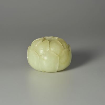 A PALE GREEN JADE 'LOTUS' WASHER 19th/20th century