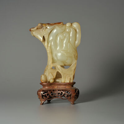 A GREEN JADE 'FINGER CITRON' INCENSE HOLDER Late Qing to Republic Period