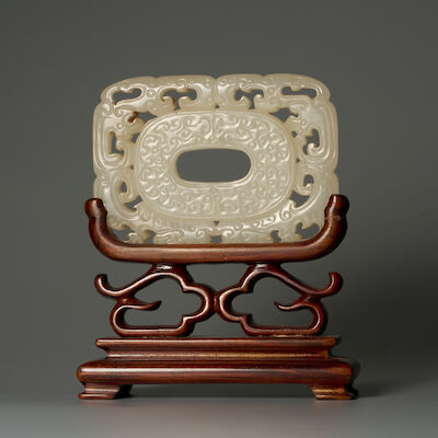AN ARCHAISTIC WHITE JADE 'KUI-DRAGON' PLAQUE 19th century