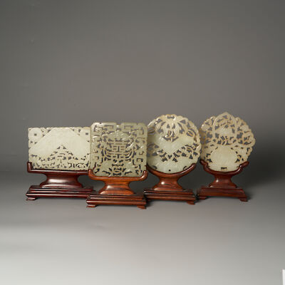 FOUR GREENISH WHITE JADE PLAQUES 19th/20th century (4)