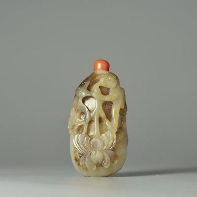 A GREENISH WHITE JADE 'MONKEY AND BAT' SNUFF BOTTLE Late Qing Dynasty