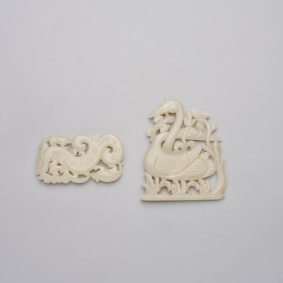 TWO GREYISH WHITE JADE 'MONGOOSE AND KUI-DRAGON' AND 'SWANS' PLAQUES Qing Dynasty (2)