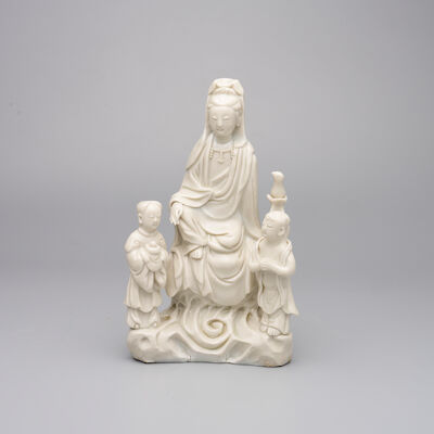 A DEHUA BLANC-DE-CHINE GROUP OF GUANYIN AND ATTENDANTS 19th century