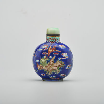 A BLUE-GROUND AND FAMILLE ROSE 'DRAGON AND QILIN' SNUFF BOTTLE 19th century