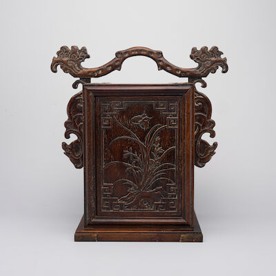 A HARDWOOD UPRIGHT RECTANGULAR THREE-DRAWER 'ORCHID AND BUTTERFLY' DESK CABINET, POSSIBLY HUANGHUALI 19th/20th century