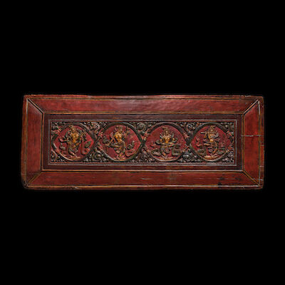 A GILT LACQUERED AND POLYCHROMED WOOD SUTRA COVER WITH FOUR FIGURES OF APSARAS TIBET, 15TH CENTURY
