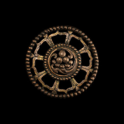 A GILT COPPER ALLOY EIGHT-PETALLED LOTUS ROUNDEL TIBET, 13TH/14TH CENTURY