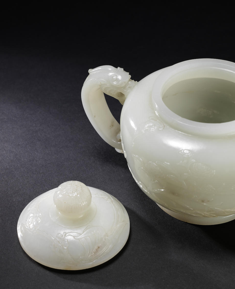 A magnificent very pale green jade teapot and cover 18th/19th century (2)