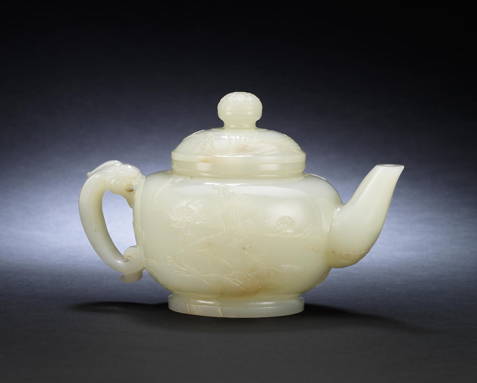 A magnificent very pale green jade teapot and cover 18th/19th century (2)